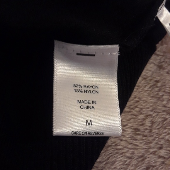 Black sweatshirt with flared out sleeves. - Picture 6 of 6